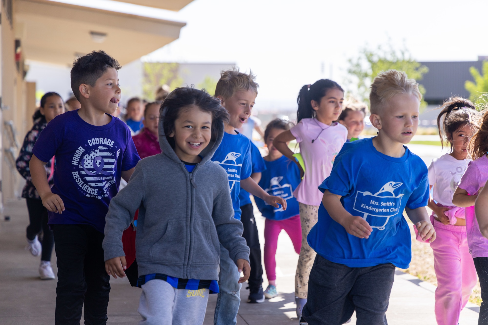 Students from Bailey Elementary School at Edwards Air Force Base participate in a "Jog-A-Thon" on Friday, April 18 as one of many activities celebrating the Month of the Military Child. Every April, the Defense Department celebrates and honors military children for their service, commitment, and sacrifices made alongside their parents in support of the military mission. (Air Force photo by Daniel Kelley).