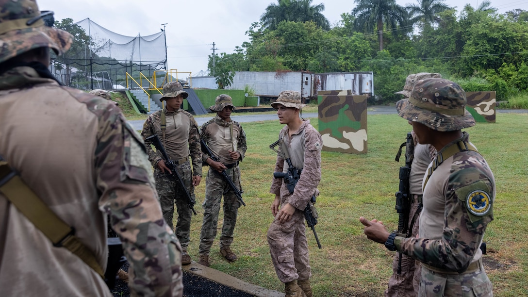 U.S. Marine Corps Cpl. Christian Cardona, a Salinas, Puerto Rico native and team leader with 1st Battalion, 8th Marines, 6th Regiment, 2d Marine Division gives critiques to Panamanian security forces on their performance in Rodman, Panama, April 22, 2025. U.S. Southern Command is focused on increasing partner nation capacity and interoperability in the region and reflects the United States’ enduring promise of friendship, partnership, and solidarity with the Panamanian people. (U.S. Marine Corps photo by Lance Cpl. Francis Hrosar)