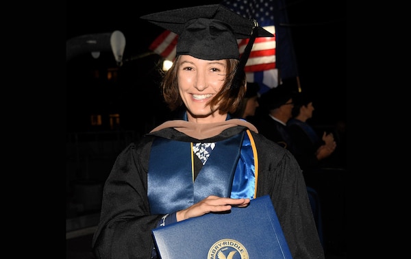 LCDR Andrea Psimer, Division Chief Office of Cutter Forces (CG-7511), was named the 2024 Vander Putten Inspirational Student of the Year (ISOY).