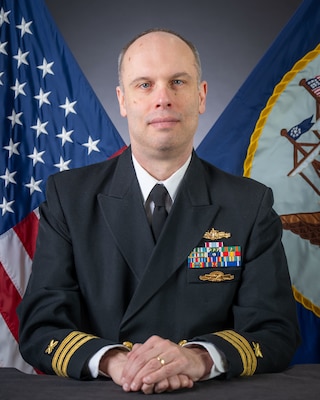 250411-N-GP524-1036 NEWPORT, R.I. -- Official portrait of Commander Mark D. Milius. (U.S. Navy photo by Brett Dodge)