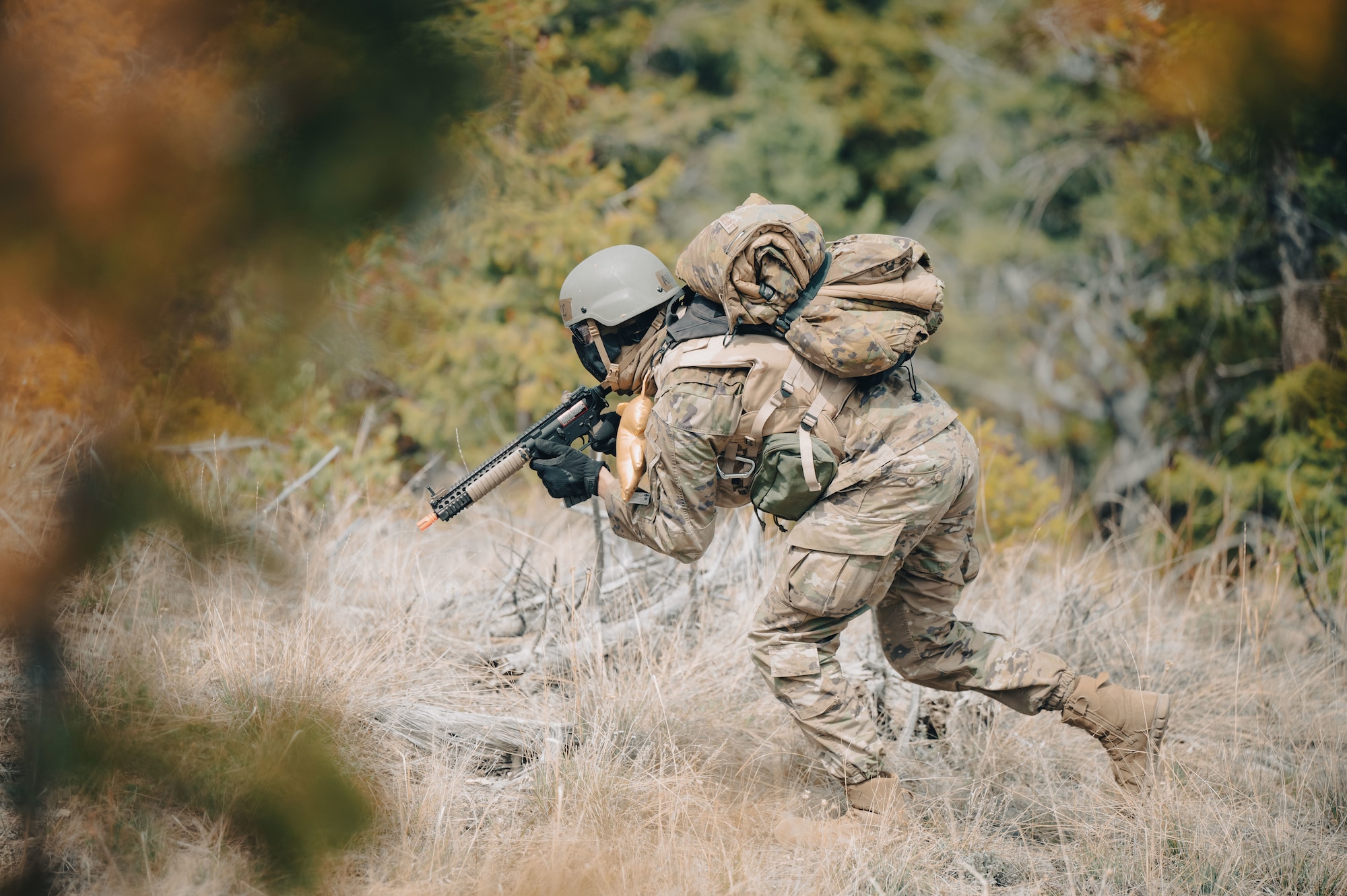 Airman running through field