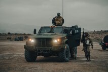 joint light tactical vehicle with airmen around it.