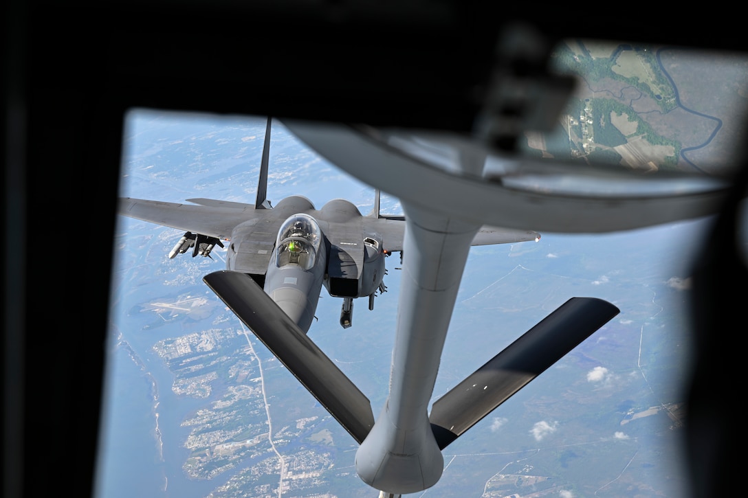 An F-15E Strike Eagle, assigned to the 4th Fighter Wing, approaches the boom of a KC-135 Stratotanker assigned to the 459th Air Refueling Wing, during an aerial refueling mission, April 22, 2025. The 4th FW maintains combat-ready forces capable of deploying worldwide on short notice. (U.S. Air Force photo by Senior Airman Gianluca Ciccopiedi)