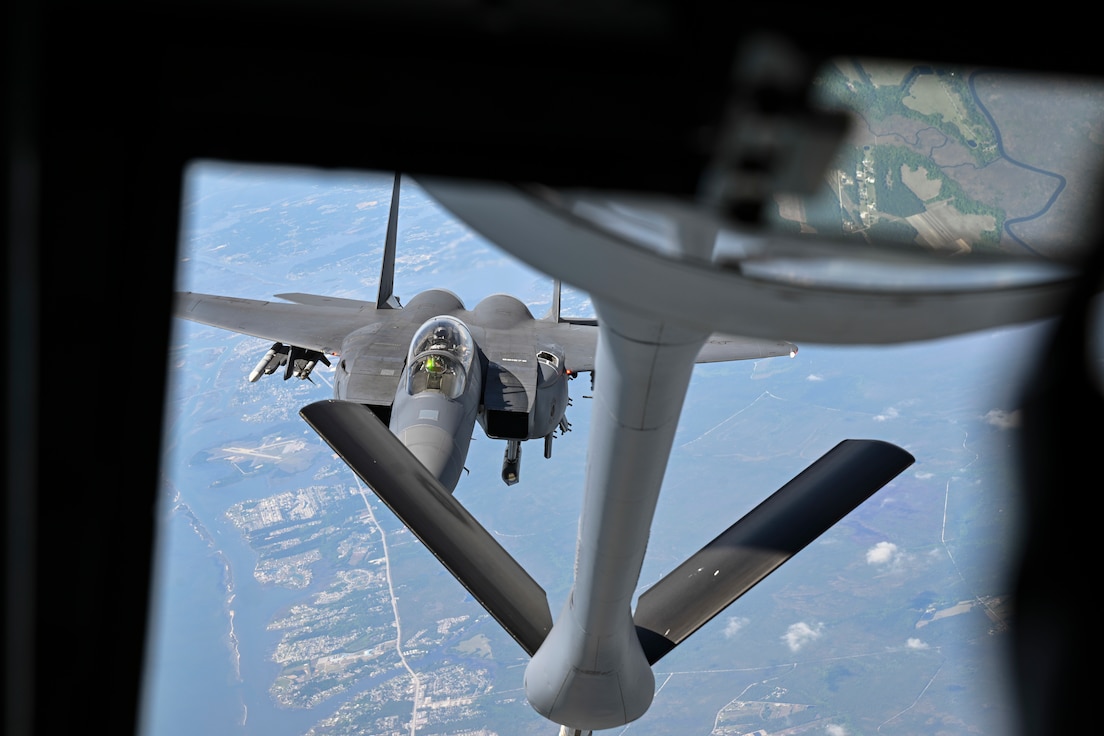 An F-15E Strike Eagle, assigned to the 4th Fighter Wing, approaches the boom of a KC-135 Stratotanker assigned to the 459th Air Refueling Wing, during an aerial refueling mission, April 22, 2025. The 4th FW maintains combat-ready forces capable of deploying worldwide on short notice. (U.S. Air Force photo by Senior Airman Gianluca Ciccopiedi)