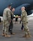 U.S Air Force Lt. Col. Matthew Dougherty, 96th Bomb Squadron commander, greets Lt. Col. Stephen Luebbert,  Louisiana Army National Guard Global Force Information Management Operations branch chief, after landing at Chennault International Airport in Lake Charles, La., April 29, 2025. The visit was part of a joint integration effort between the 2nd Bomb Wing, 159th Fighter Wing, and the Louisiana Army National Guard to strengthen interoperability and explore future operational opportunities at Chennault International Airport. (U.S. Air Force photo by Senior Airman Seth Watson)