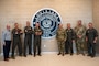 Leadership from the 2nd Bomb Wing, 159th Fighter Wing, Louisiana National Guard and Chennault International Airport pose for a group photo in the National Guard facilities at Chennault International Airport in Lake Charles, La., April 29, 2025. The event brought together senior leaders to assess the utility of Chennault’s infrastructure for future missions and build a framework for more regular collaboration between the 2nd Bomb Wing, 159th Fighter Wing, and Louisiana National Guard. (U.S. Air Force photo by Senior Airman Seth Watson)