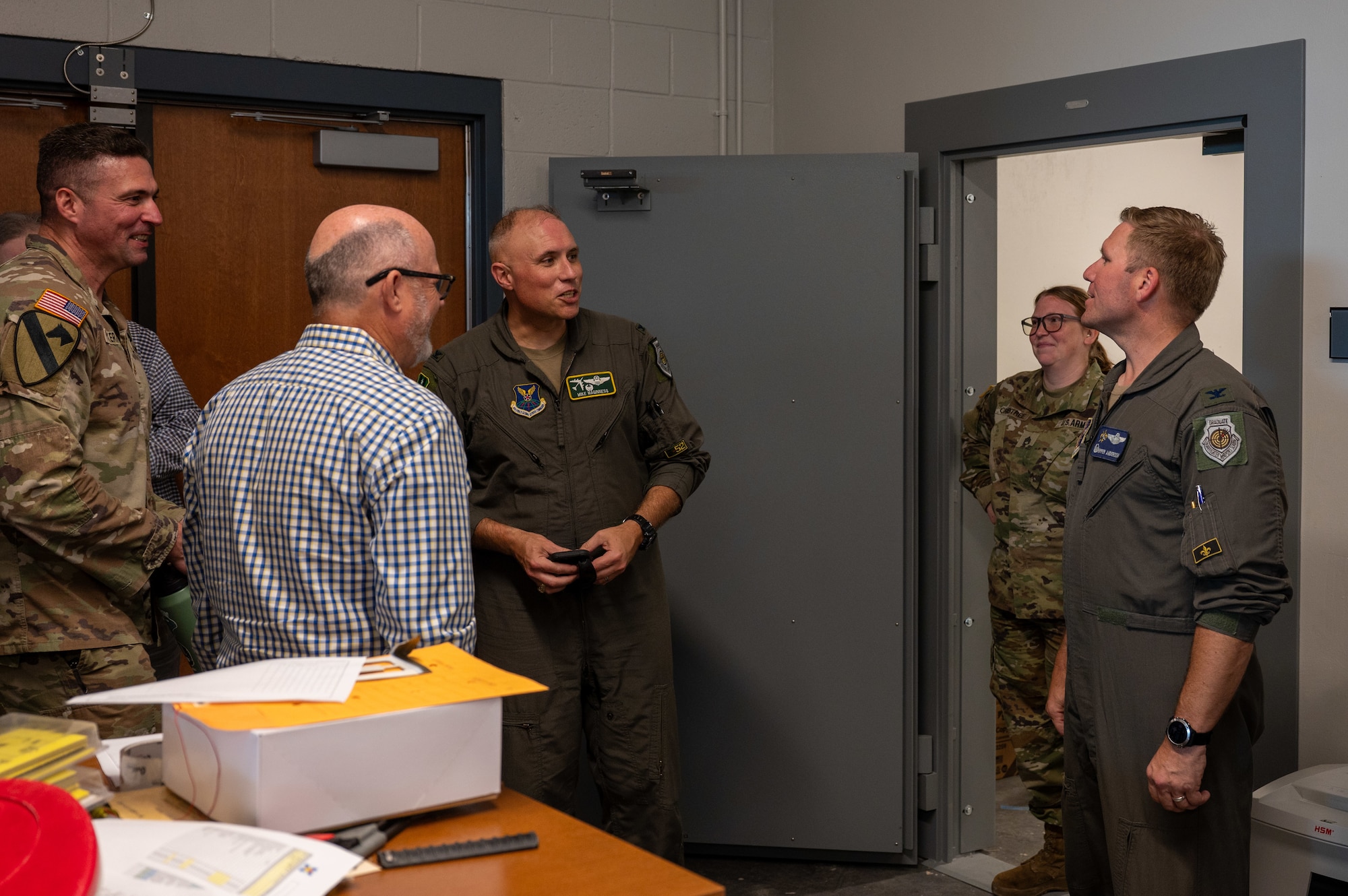 U.S. Air Force Col. Michael Maginness, 2nd Bomb Wing commander, and Col. David Anderson, 159th Fighter Wing commander, tour the National Guard facilities at Chennault International Airport in Lake Charles, La., April 29, 2025. Leadership from the 2nd Bomb Wing and 159th Fighter Wing worked together to assess the possibility of future use of the National Guard facilities at Chennault. (U.S. Air Force photo by Senior Airman Seth Watson)