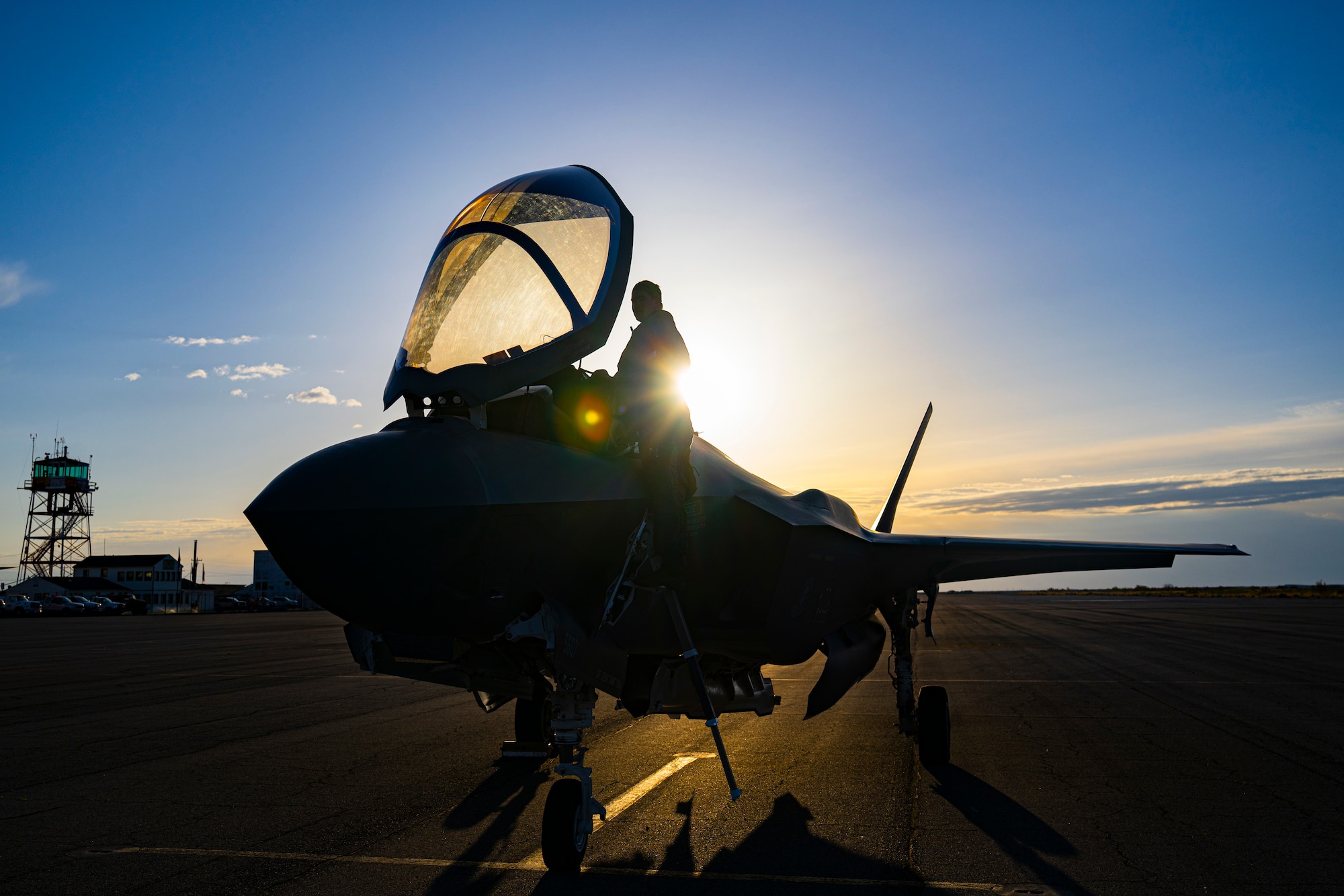 A photo of a pilot climbing into an F-35