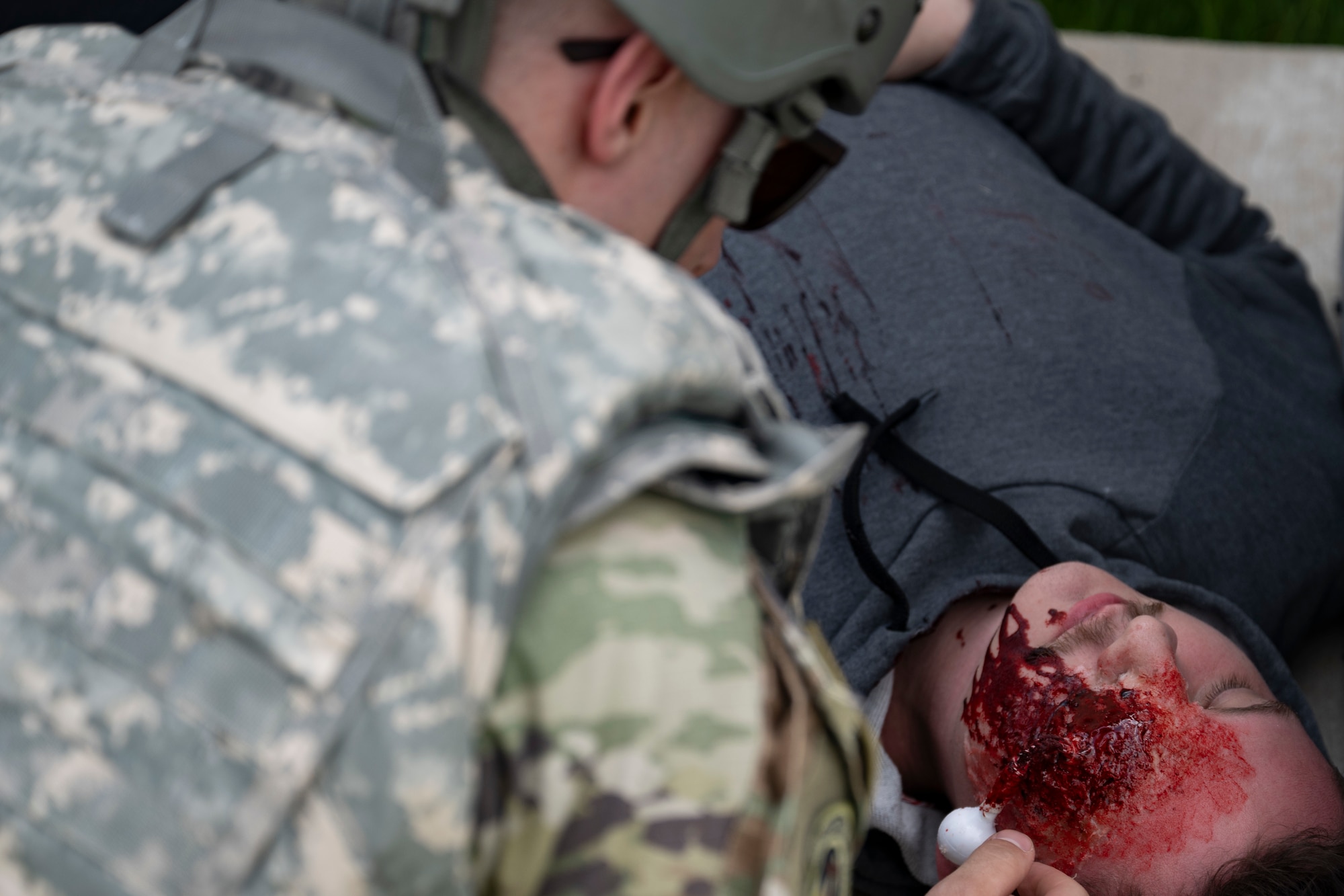 A photo of an Airman with a simulated combat injury