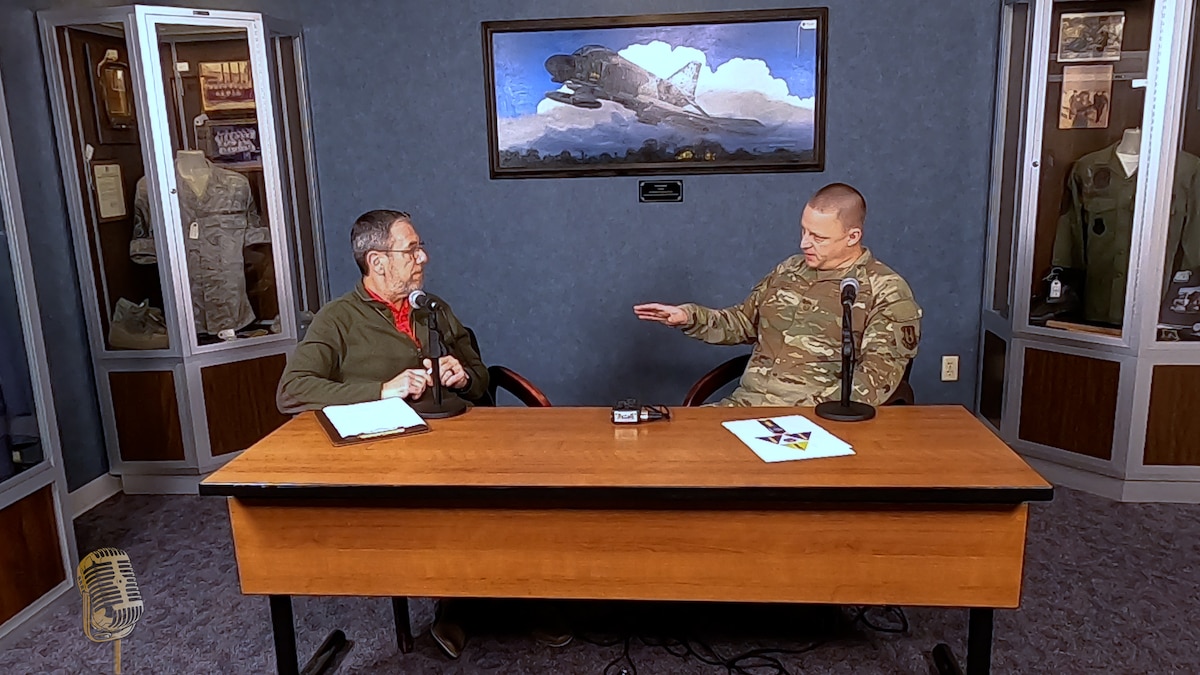 two people sitting at table