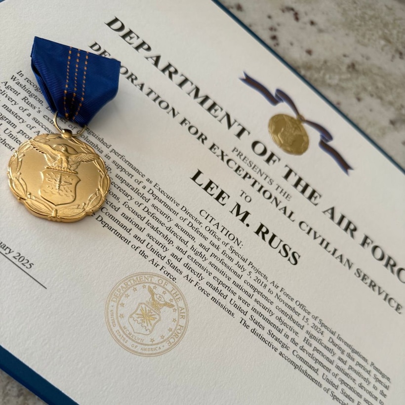 Special Agents Lee Russ and Sean Lynch, from the Air Force Office of Special Investigations’ Office of Special Projects (PJ), received the Department of the Air Force Decoration for Exceptional Civilian Service, April 23, 2025, at the Pentagon in Arlington, Virginia.