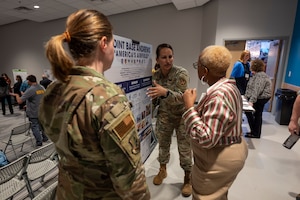 Photo of Airmen and community members