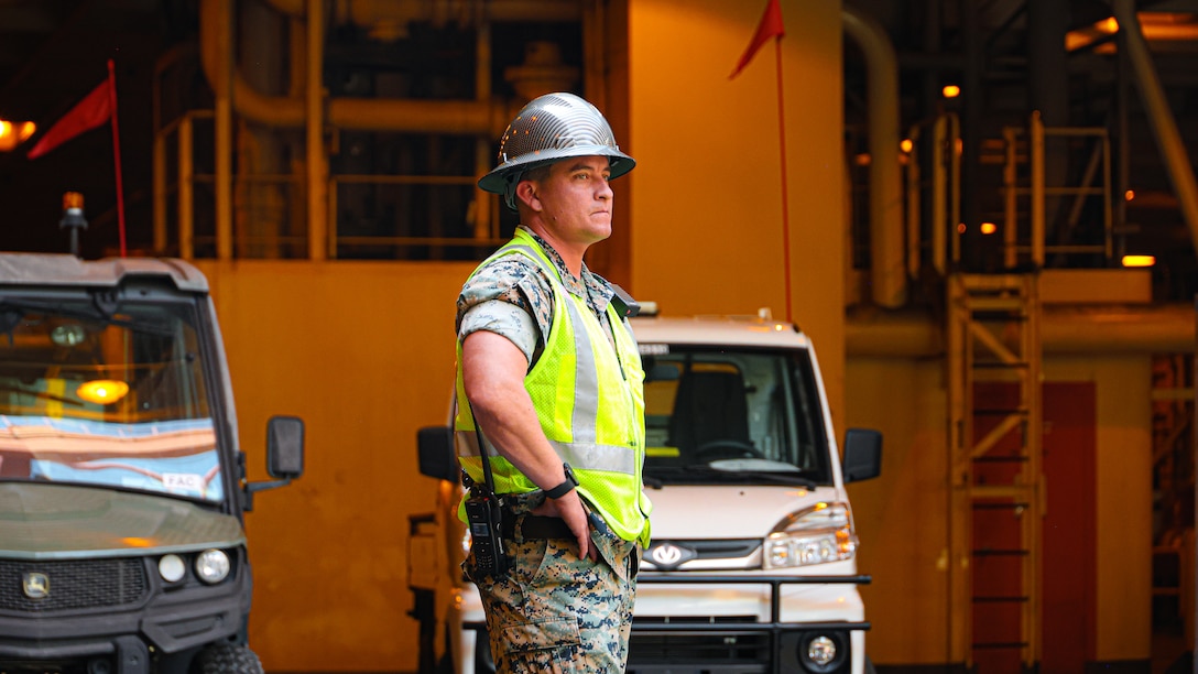 U.S. Marine Corps Chief Warrant Officer 2 Alexander Woodward, Officer in Charge, Port Operations, Supervises the offload of the United States Naval Ship Seay (T-AKR 302)  in preparation for the Maritime Prepositioning Force Maintenance Cycle (MMC) 14 at Marine Corps Support Facility Blount Island. 

The Maritime Prepositioning Force Maintenance Cycle (MMC) is a routine process for maintaining and replenishing the equipment and supplies carried by Maritime Prepositioning Ships (MPS). It ensures the MPS remain ready for deployment and are equipped with the necessary supplies for operations. The cycle typically lasts 42 to 45 days per ship and involves checking the serviceability of the equipment and replenishing stocks.
