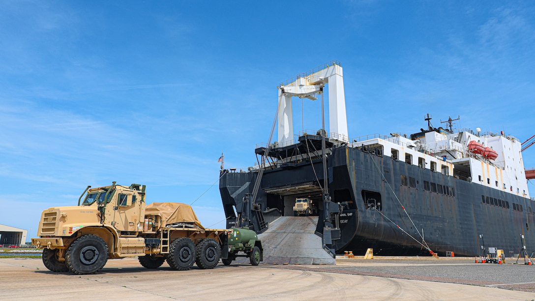 U.S. Marine Corps Maritime Prepositioning Force assets from the United States Naval Ship Seay (T-AKR 302) Roll off from the stern ramp in preparation for the Maritime Prepositioning Force Maintenance Cycle (MMC) 14 at Marine Corps Support Facility Blount Island. 

The Maritime Prepositioning Force Maintenance Cycle (MMC) is a routine process for maintaining and replenishing the equipment and supplies carried by Maritime Prepositioning Ships (MPS). It ensures the MPS remain ready for deployment and are equipped with the necessary supplies for operations. The cycle typically lasts 42 to 45 days per ship and involves checking the serviceability of the equipment and replenishing stocks.