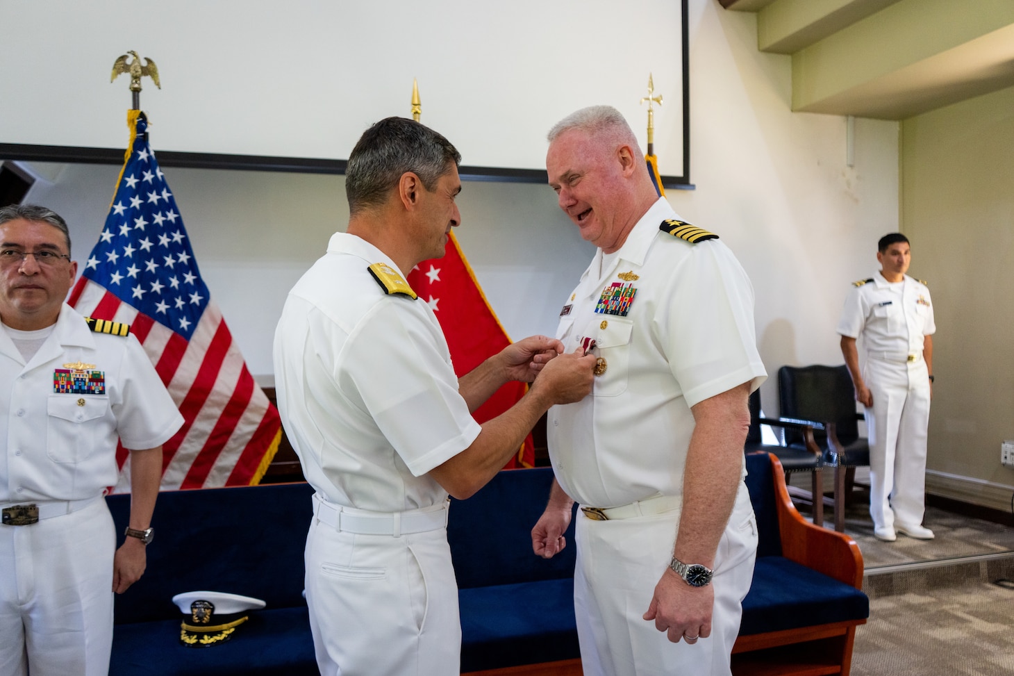 Rear Adm. Todd F. Cimicata, Commander, Logistics Group Western Pacific/ Task Force 73, presents Capt. Robert R. Williams, outgoing commander, Military Sealift Command Far East, with the Legion of Merit medal during a change of command ceremony at the Singapore Naval Installation in Sembawang, April 30, 2025, recognizing his achievements over the past two and a half years as Commodore of MSC Far East.