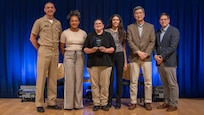 Naval Surface Warfare Center, Carderock Division leadership stands with the award winners of the Command Leadership Department’s High Performance Team award at an annual Command Awards Ceremony in West Bethesda, Md. on April 29, 2025. From left: Carderock Commanding Officer, Capt. Chris Matassa, Anna Rucker, Katherine Citro, Julia Medina, Carderock Acting Technical Director, Dr. Paul Shang and Deputy Division Technical Director, Dr. Dave Drazen.