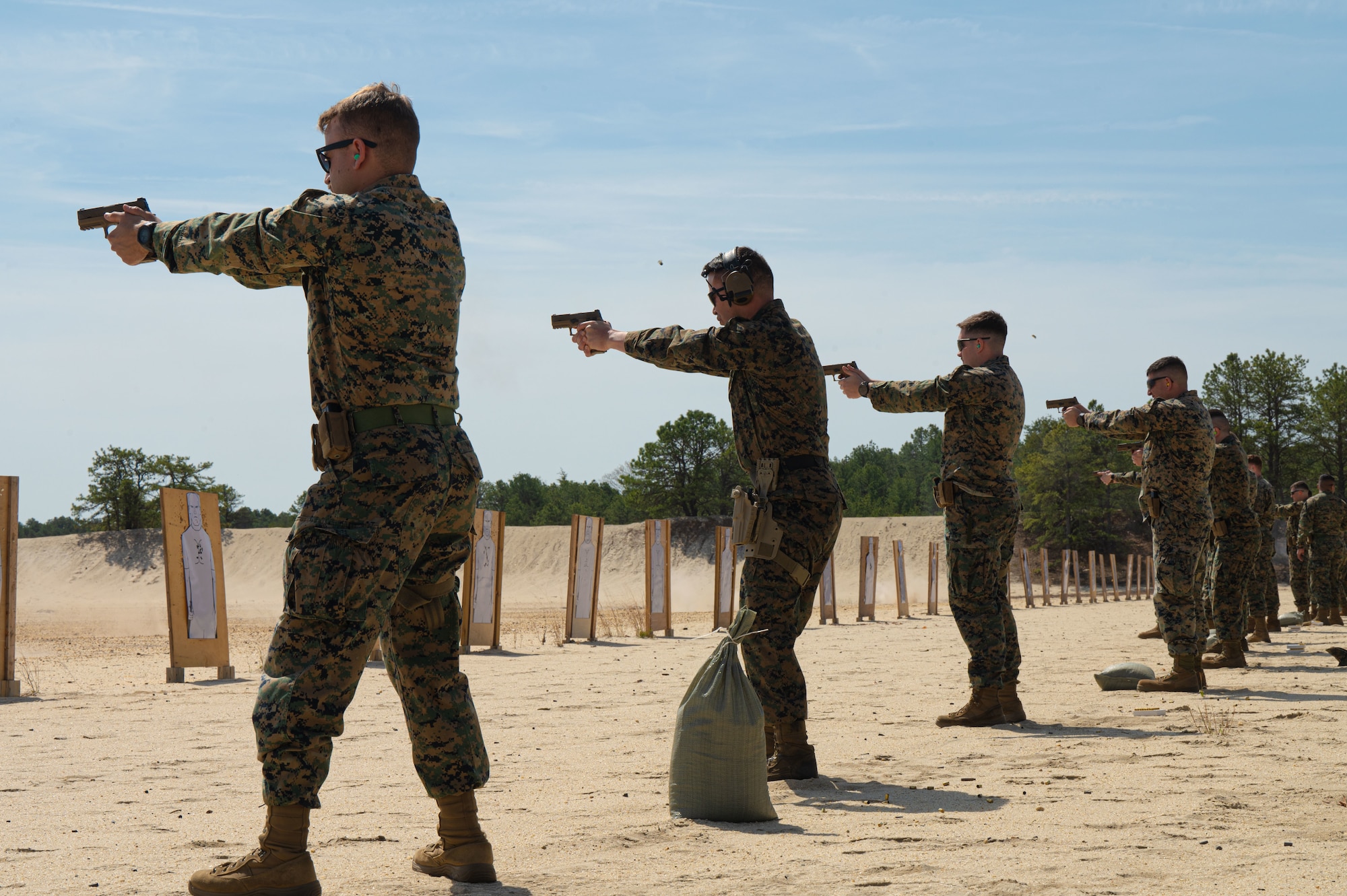 U.S. Marine Corps Marines assigned to Marine Aircraft Group 49 participate in pistolqualification on a range at Joint Base McGuire-Dix-Lakehurst, N.J., April 25, 2025.MAG-49 is a U.S. Marine Corps aviation group ready to aid and reinforce Marine forces through various operations and national emergencies.(U.S. Air Force photo by Airman 1st Class Luisa E. Dugan)