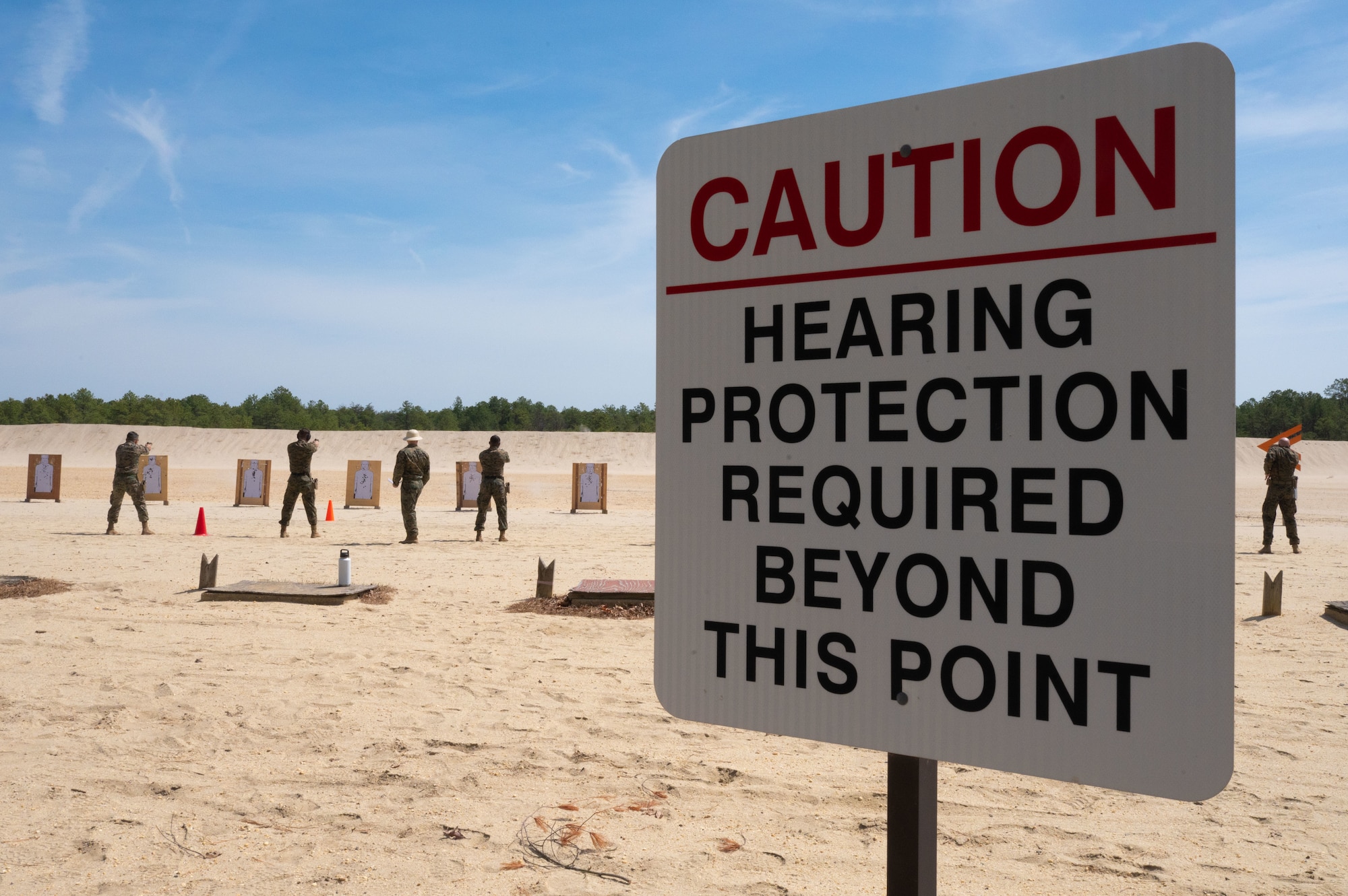 U.S. Marine Corps Marines assigned to Marine Aircraft Group 49 participate in pistolqualification on a range at Joint Base McGuire-Dix-Lakehurst, N.J., April 25, 2025. MAG-49 Marines trained in weapons qualification, land navigation and Chemical, Biological, Radiological, and Nuclear (CBRN) defense as a part of routine training.(U.S. Air Force photo by Airman 1st Class Luisa E. Dugan)