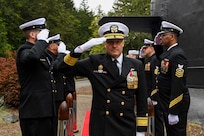 Rear Adm. Thomas Wall arrives to a change of command ceremony at Naval Base Kitsap-Bangor, April 29, 2025. During the ceremony Rear Adm. Christopher Nash relieved Wall as commander of Submarine Group (SUBGRU) 9. SUBGRU-9 exercises administrative control authority for assigned submarine commands and units in the Pacific Northwest providing oversight for shipboard training, personnel, supply and material readiness of SSBNs and their crews. SUBGRU-9 is also responsible for nuclear submarines undergoing conversion or overhaul at Puget Sound Naval Shipyard in Bremerton, Washington. (U.S. Navy photo by Mass Communication Specialist 2nd Class Gwendelyn L. Ohrazda)