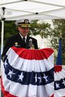 Rear Adm. Thomas Wall delivers remarks during a change of command ceremony at Naval Base Kitsap-Bangor, April 29, 2025. During the ceremony Rear Adm. Christopher Nash relieved Wall as commander of Submarine Group (SUBGRU) 9. SUBGRU-9 exercises administrative control authority for assigned submarine commands and units in the Pacific Northwest providing oversight for shipboard training, personnel, supply and material readiness of SSBNs and their crews. SUBGRU-9 is also responsible for nuclear submarines undergoing conversion or overhaul at Puget Sound Naval Shipyard in Bremerton, Washington. (U.S. Navy photo by Mass Communication Specialist 2nd Class Gwendelyn L. Ohrazda)