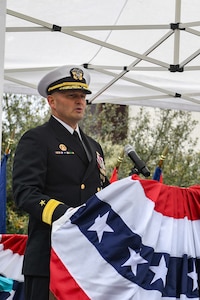 Rear Adm. Christopher Nash delivers remarks during a change of command ceremony at Naval Base Kitsap-Bangor, April 29, 2025. During the ceremony Nash relieved Rear Adm. Thomas Wall as commander of Submarine Group (SUBGRU) 9. SUBGRU-9 exercises administrative control authority for assigned submarine commands and units in the Pacific Northwest providing oversight for shipboard training, personnel, supply and material readiness of SSBNs and their crews. SUBGRU-9 is also responsible for nuclear submarines undergoing conversion or overhaul at Puget Sound Naval Shipyard in Bremerton, Washington. (U.S. Navy photo by Mass Communication Specialist 2nd Class Gwendelyn L. Ohrazda)