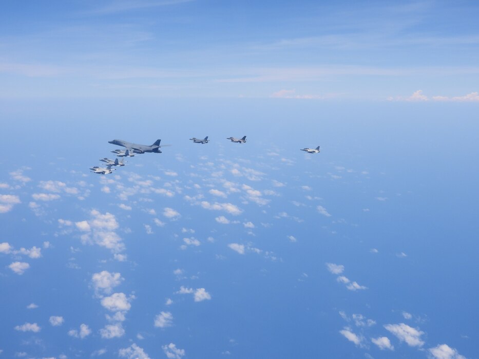 A U.S. Air Force B-1 Lancer, U.S. Air Force F-16 Fighting Falcons, and U.S. Marine Corps F/A-18 Hornets fly together with Philippine Air Force FA-50PH fighter jets during a multilateral Maritime Cooperative Activity (MCA) within the Philippines’ Exclusive Economic Zone, April 29, 2025.
