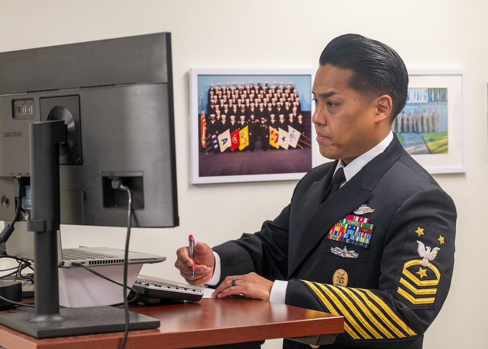 Force Master Chief PatrickPaul Mangaran, director of the Hospital Corps, interviews finalists for the Navy Medicine Sailor of the Year competition at Defense Health Headquarters, April 21.