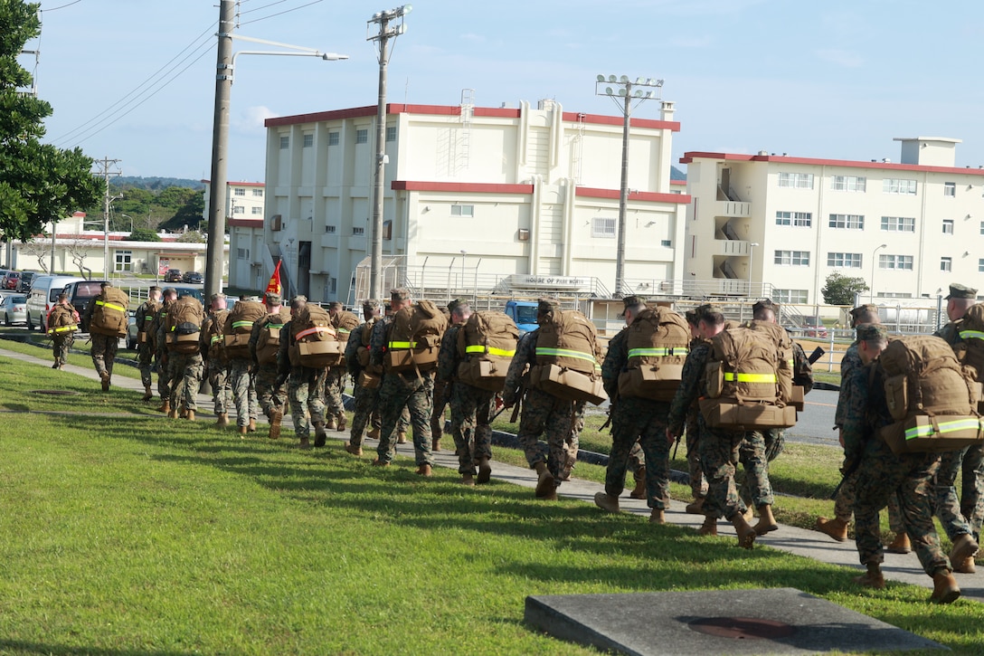 CAMP HANSEN, Okinawa, Japan (April 9, 2025) — The Marines and Sailors of the 3D Marine Expeditionary Brigade approach the end of the 10-kilometer conditioning hike, completing the rigorous course designed to enhance physical readiness and prepare for rapid crisis response and humanitarian assistance across the Indo-Pacific. (U.S. Marine Corps photo by 2nd Lt. Giovanni A. Jimenez)