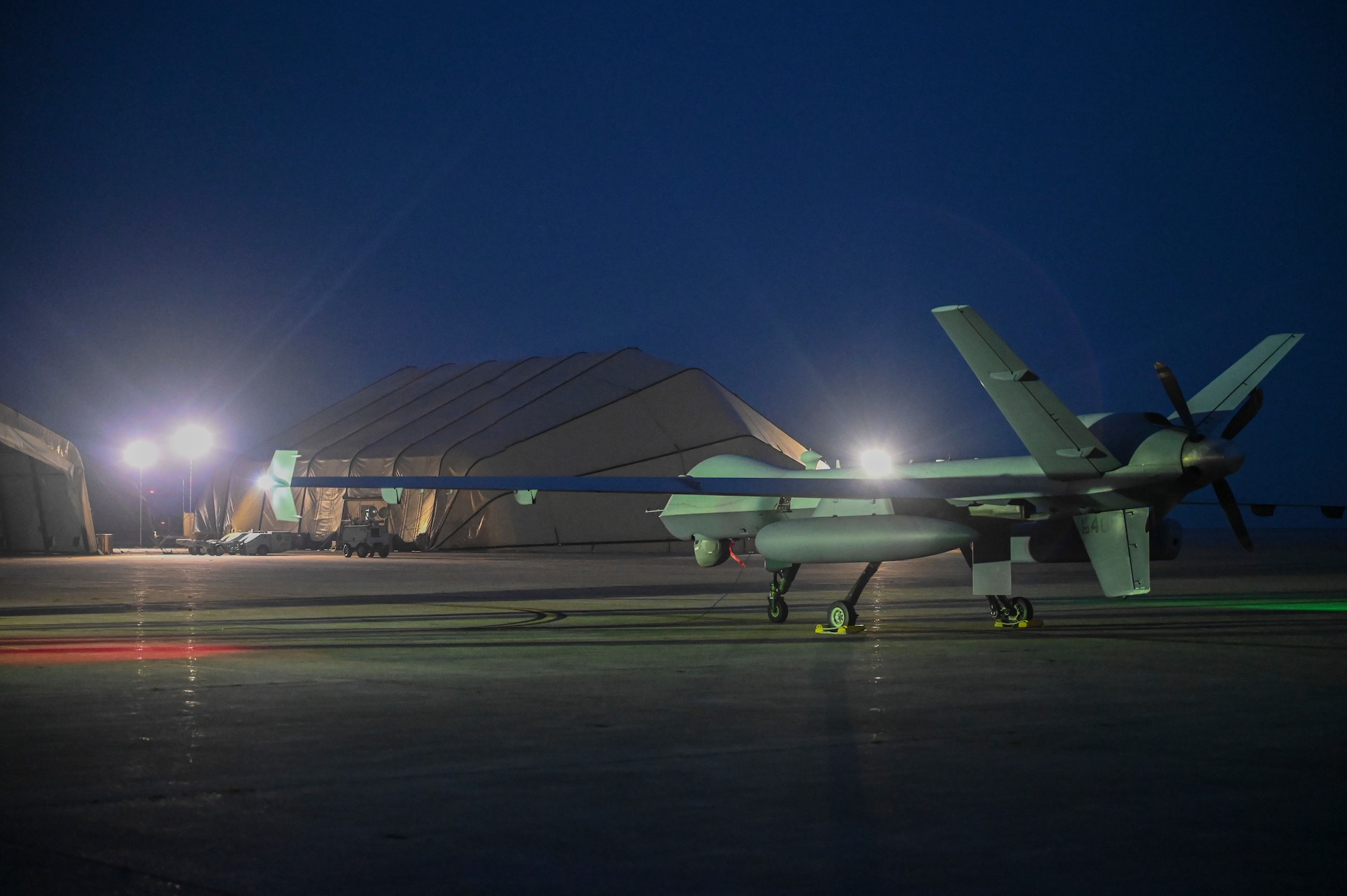 An MQ-9 Reaper parks after arriving to support exercise Freedom Flag 25-1 at Kunsan Air Base, Republic of Korea, April 17, 2025.