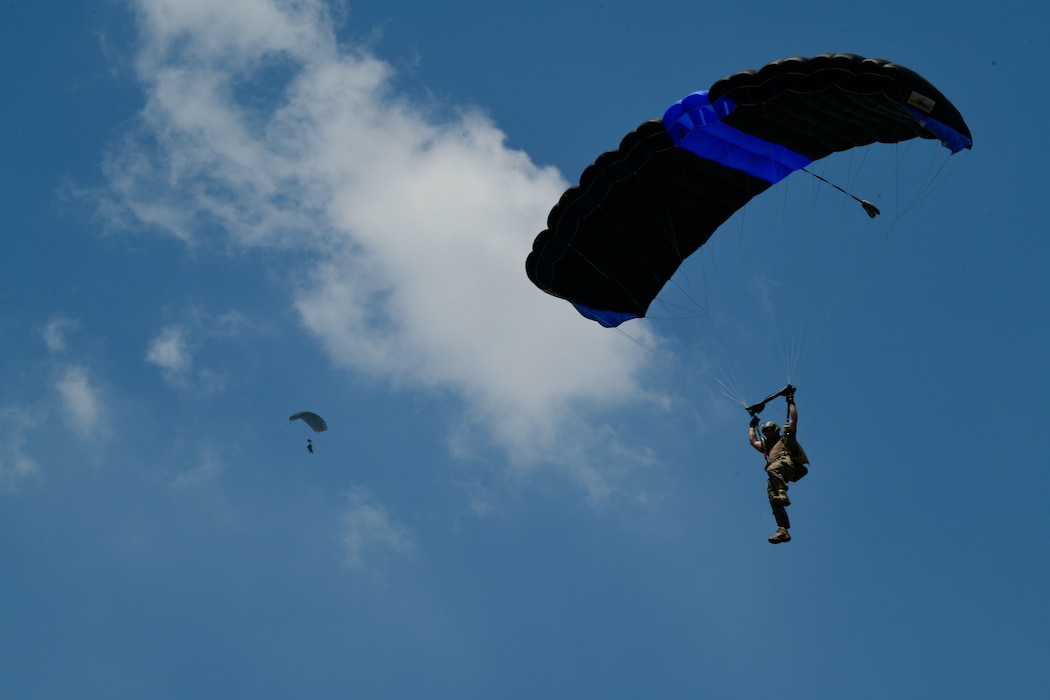 U.S. Air Force Air Commandos assigned to the 353rd Special Operations Wing jump from an MC-130J Commando II during static line jump training as part of Exercise Balikatan 25 at Fort Magsaysay, Philippines, April 25, 2025.