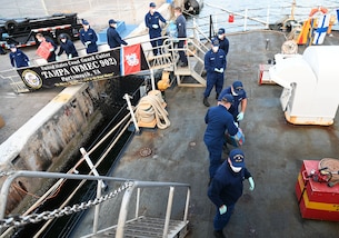 Crew members aboard USCGC Tampa (WMEC 902) offload 59 bales of illicit drugs worth more than $12 million at Port Everglades in Fort Lauderdale, Florida, April 30, 2025. The seized contraband was the result of two interdictions in the Caribbean Sea by the crew of USS Minneapolis-Saint Paul and their embarked Navy helicopter and Coast Guard law enforcement detachments. (U.S. Coast Guard photo by Petty Officer 1st Class Diana Sherbs)