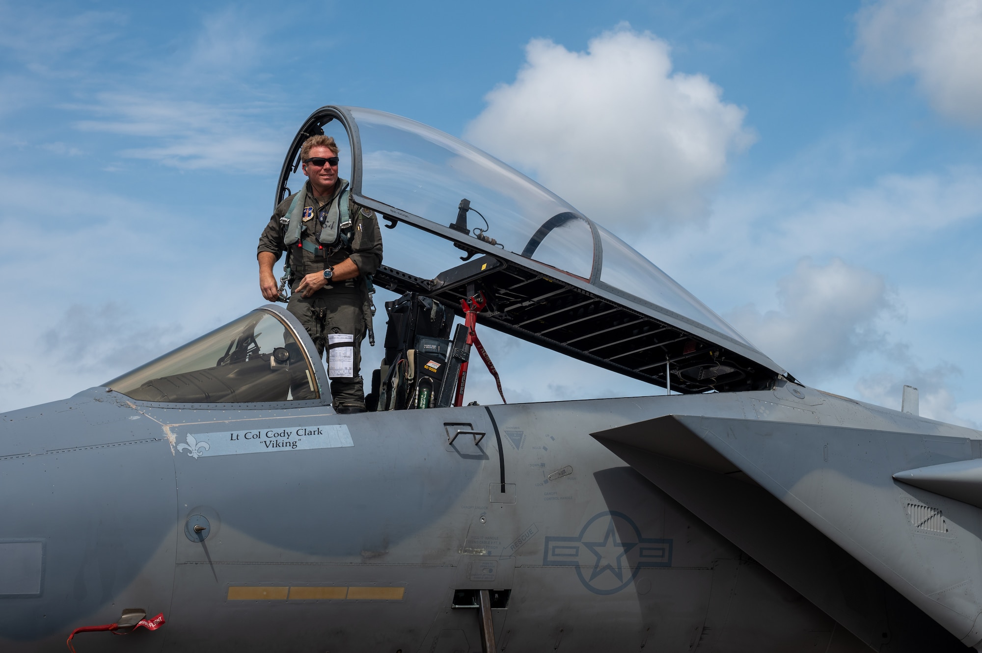 U.S. Air Force Col. David Anderson, 159th Fighter Wing commander, exits an F-15C Eagle, after landing at Chennault International Airport in Lake Charles, La., April 29, 2025. The 159th Fighter Wing worked with leadership from the 2nd Bomb Wing to train together and build a greater working relationship. (U.S. Air Force photo by Senior Airman Seth Watson)