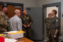 U.S. Air Force Col. Michael Maginness, 2nd Bomb Wing commander, and Col. David Anderson, 159th Fighter Wing commander, tour the National Guard facilities at Chennault International Airport in Lake Charles, La., April 29, 2025. Leadership from the 2nd Bomb Wing and 159th Fighter Wing worked together to assess the possibility of future use of the National Guard facilities at Chennault. (U.S. Air Force photo by Senior Airman Seth Watson)