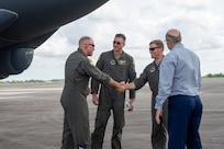 U.S. Air Force Col. Michael Maginness, 2nd Bomb Wing commander, greets Col. David Anderson, 159th Fighter Wing commander, after landing at Chennault International Airport in Lake Charles, La., April 29, 2025. Leadership from the 2nd Bomb Wing and 159th Fighter Wing conducted tactical training together and toured the local facilities to assess how the units could utilize the facilities for future training.  (U.S. Air Force photo by Senior Airman Seth Watson)