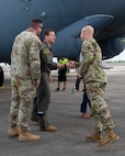 U.S Air Force Lt. Col. Matthew Dougherty, 96th Bomb Squadron commander, greets Lt. Col. Stephen Luebbert,  Louisiana Army National Guard Global Force Information Management Operations branch chief, after landing at Chennault International Airport in Lake Charles, La., April 29, 2025. The visit was part of a joint integration effort between the 2nd Bomb Wing, 159th Fighter Wing, and the Louisiana Army National Guard to strengthen interoperability and explore future operational opportunities at Chennault International Airport. (U.S. Air Force photo by Senior Airman Seth Watson)