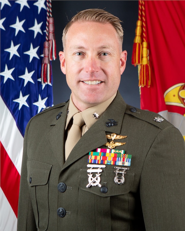 Lieutenant Colonel (LtCol) Aaron Maxwell, a native of Albuquerque, New Mexico, enlisted in the Marine Corps in 2001 as a field radio operator and was assigned to 1st Battalion, 14th Marines. In 2003, he transferred to 4th Reconnaissance Battalion, and in 2005 was attached to 3rd Battalion, 25th Marines as the Tactical Air Control Party Chief for deployment to Al Anbar, Iraq. Due to combat losses, he served as the Kilo Company Joint Terminal Air Controller.