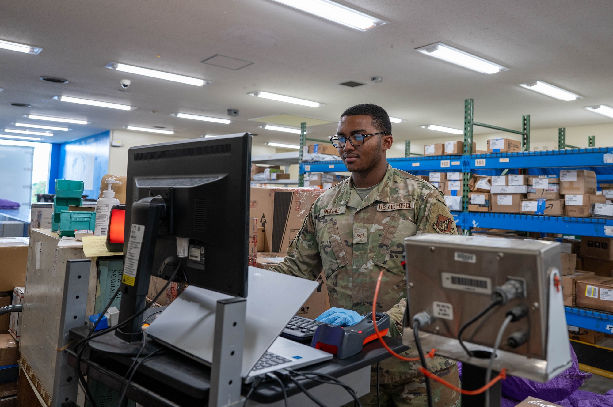 Service member checks computer.