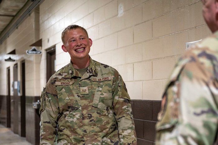 U.S. Air Force Staff Sgt. Bryce Vincent, 51st Maintenance Squadron corrosion control lead, discusses product requests with a customer at Osan Air Base, Republic of Korea, July 31, 2025.