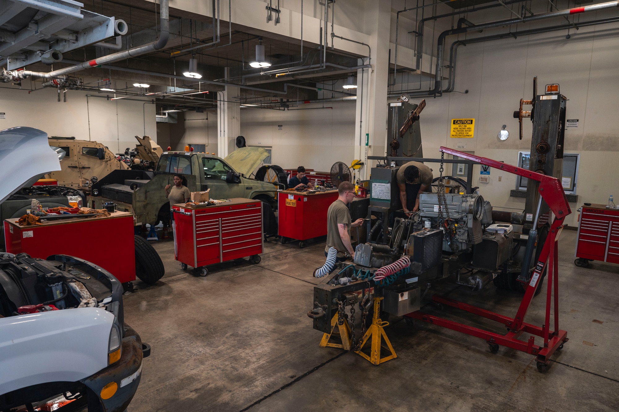 Members of the U.S. Air Force 18th Logistics Readiness Squadron perform routine maintenance at Kadena Air Base, Japan, July 30, 2025.