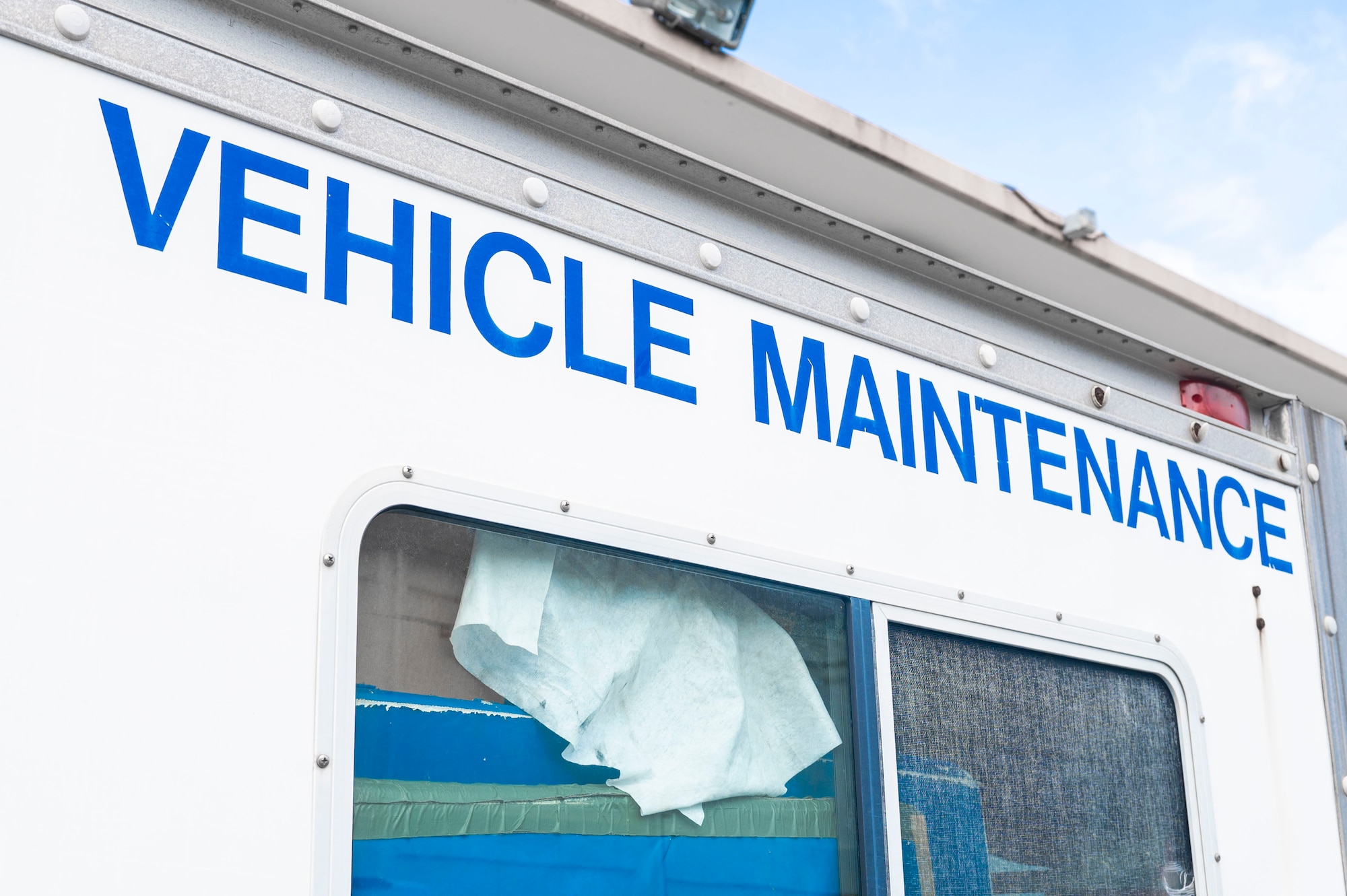 A truck assigned to the 18th Logistics Readiness Squadron vehicle maintenance flight is parked outside of a building on Kadena Air Base, Japan, July 30, 2025.
