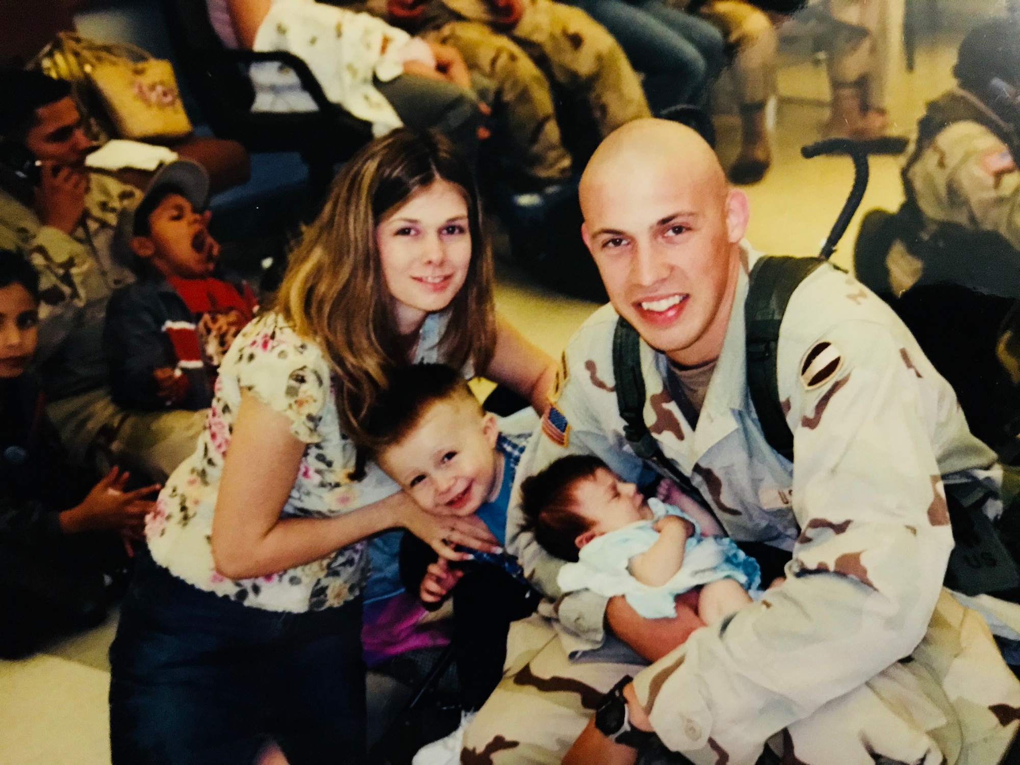 A family poses for a photo.