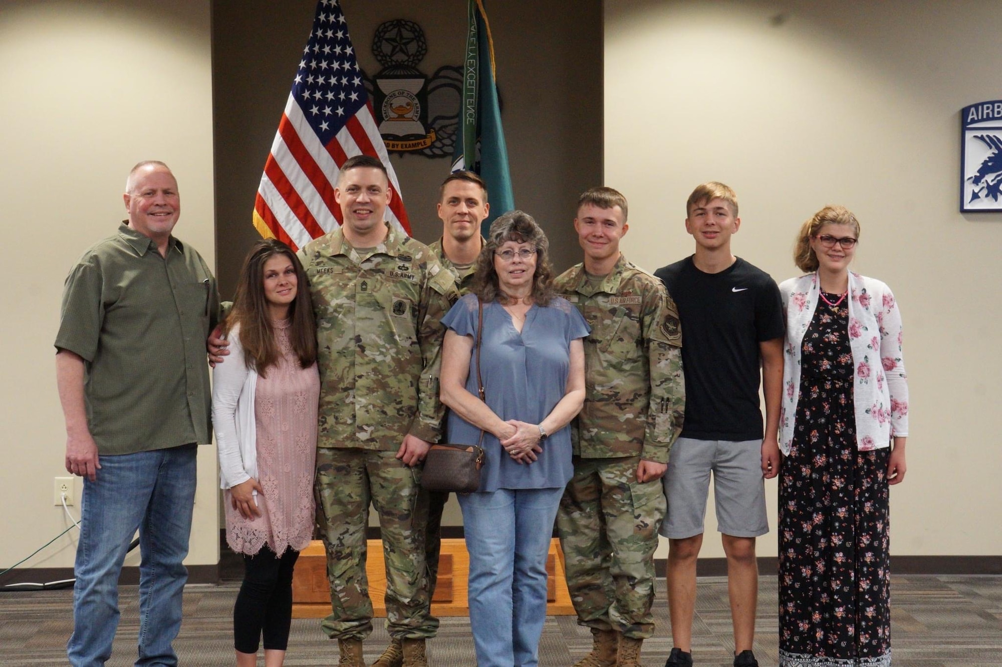 A family poses for a photo.