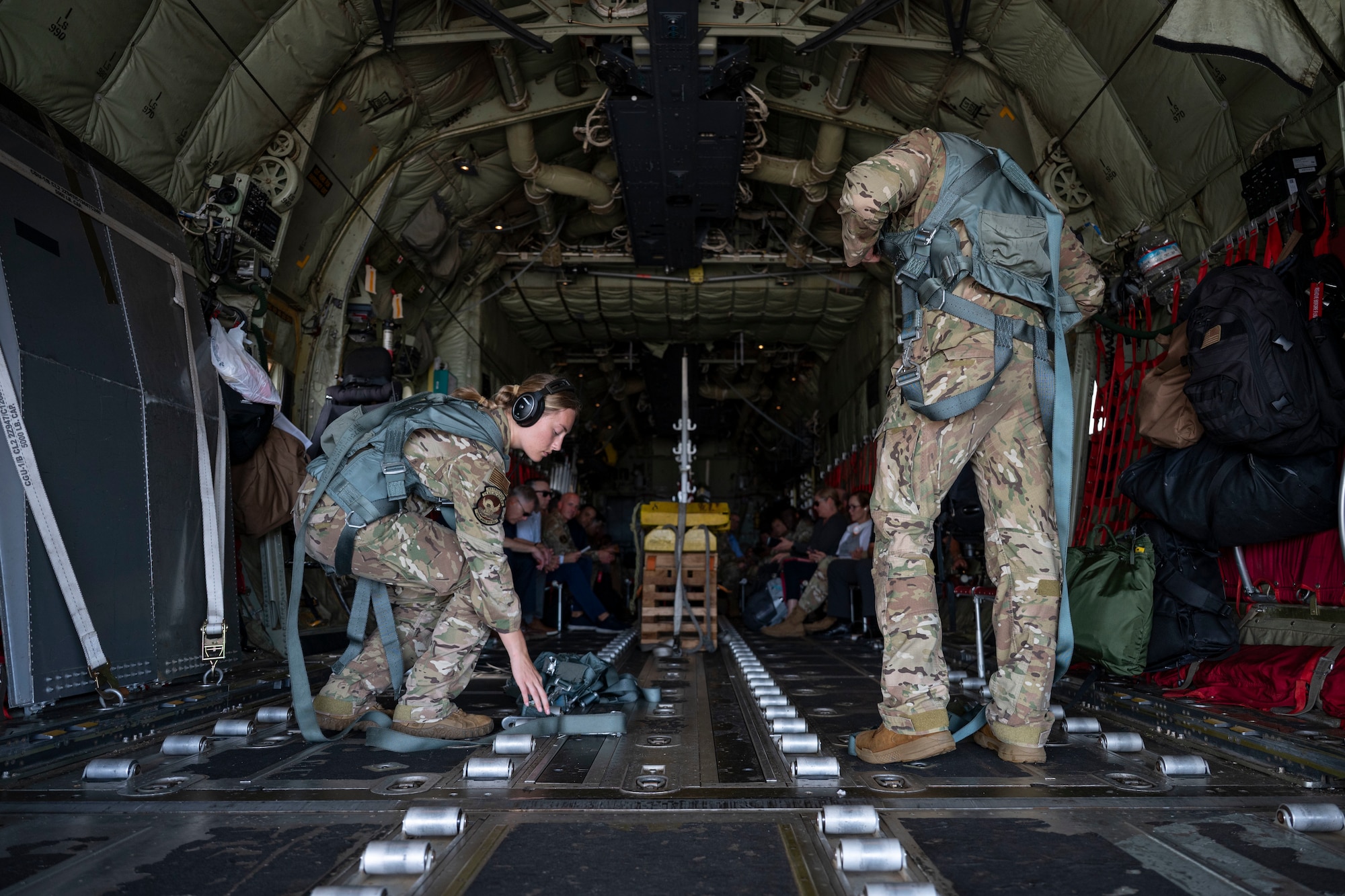 Airmen fly on a C-130J in Guam