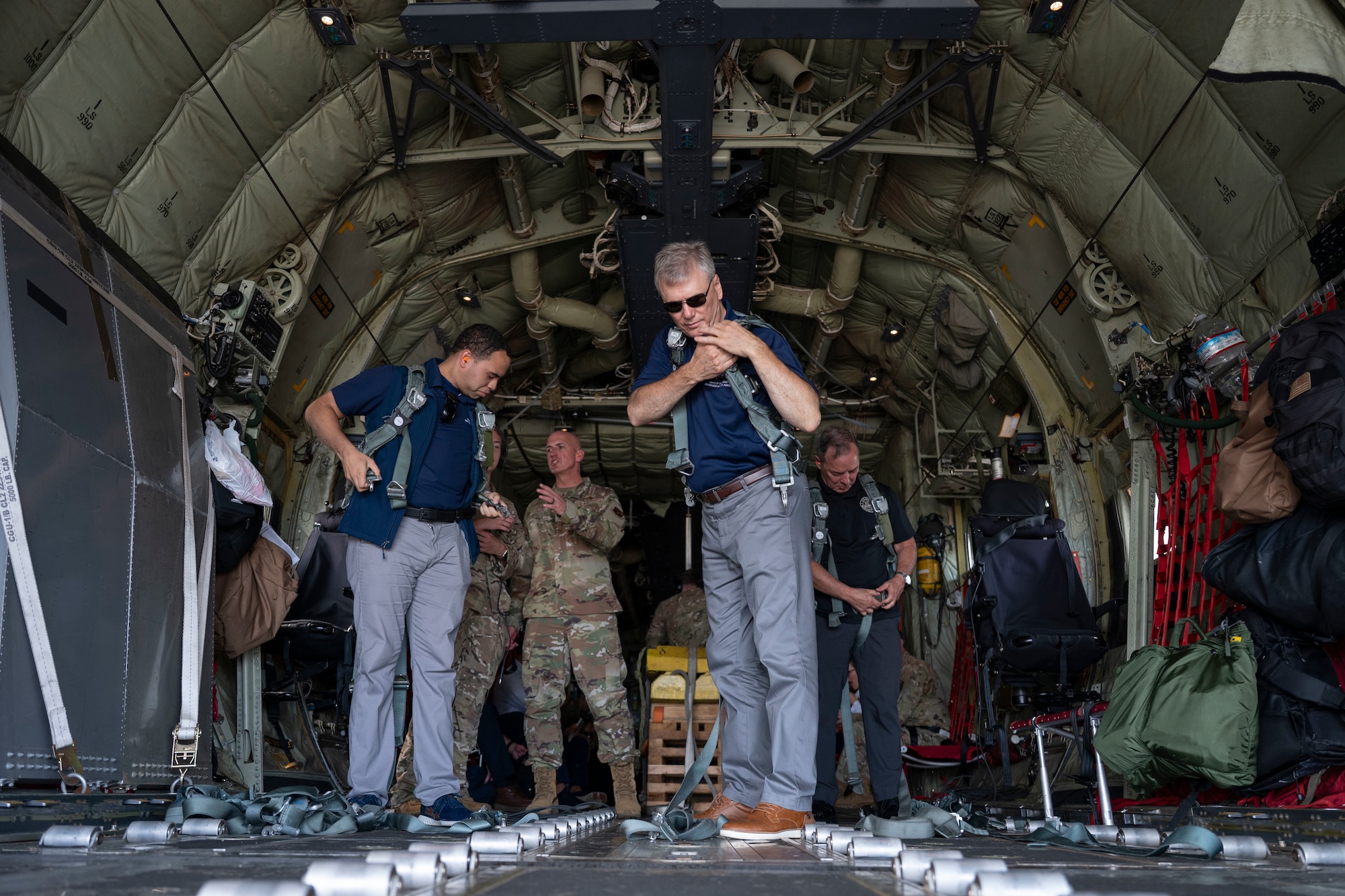 Airmen fly on a C-130J in Guam