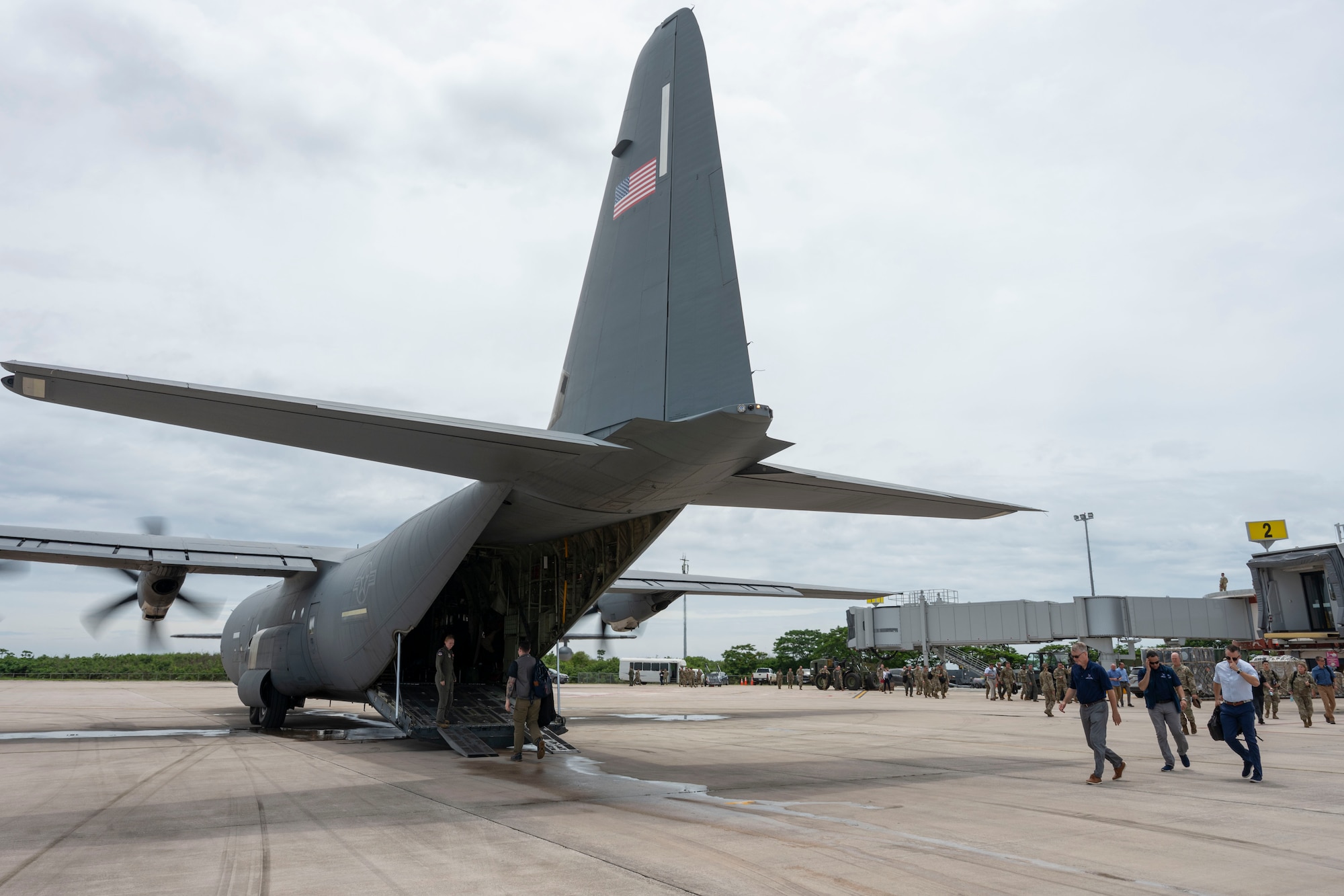 Airmen fly on a C-130J in Guam
