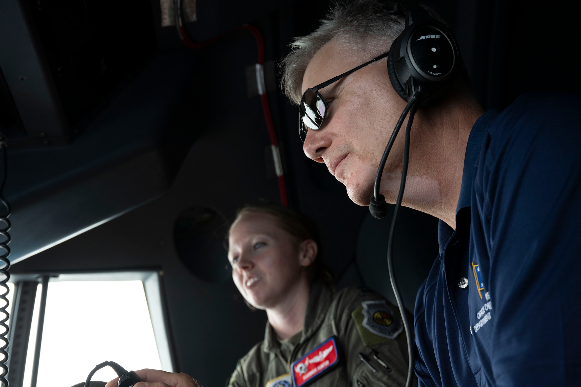 Airmen fly on a C-130J in Guam