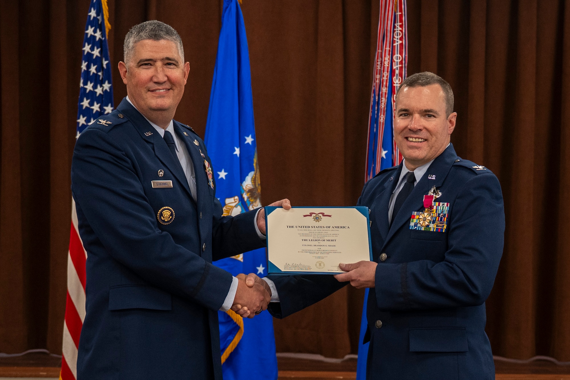 Col Stremmel and Col Shade posing for a photo.