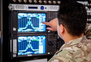 Airman working electronics equipment