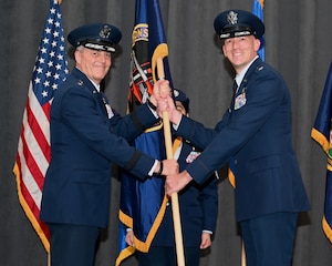 Maj. Gen. Jason Armagost, left, Eighth Air Force and Joint-Global Strike Operations Center commander, poses for a picture with Lt. Col. Benjamin Kempen