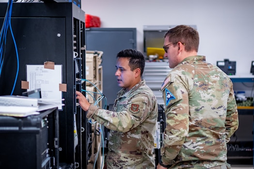  A U.S. Space Force Guardian assigned to the 25th Space Range Squadron, Space Delta 11, right, and an airman assigned to the 379th Space Range Squadron, left, operate a spectrum analyzer during exercise Resolute Space 2025 in Colorado Springs, Colo., July 29, 2025. The 25th SRS and 379th SRS supported Resolute Space, Resolute Forces Pacific (REFORPAC) and the broader Department-Level Exercise with an electromagnetic range environment for realistic training.  (U.S. Space Force photo by Isaac Blancas)